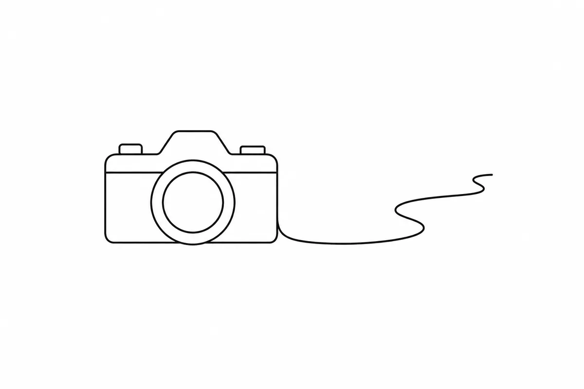 Minimalist camera and winding path tattoo concept representing memory and travel